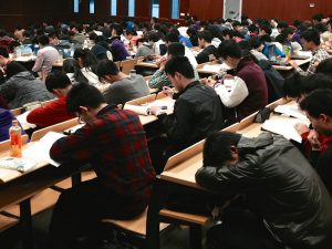 college lecture with someone sleeping